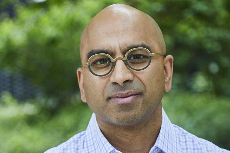 Portrait of Randy Boyagoda smiling.