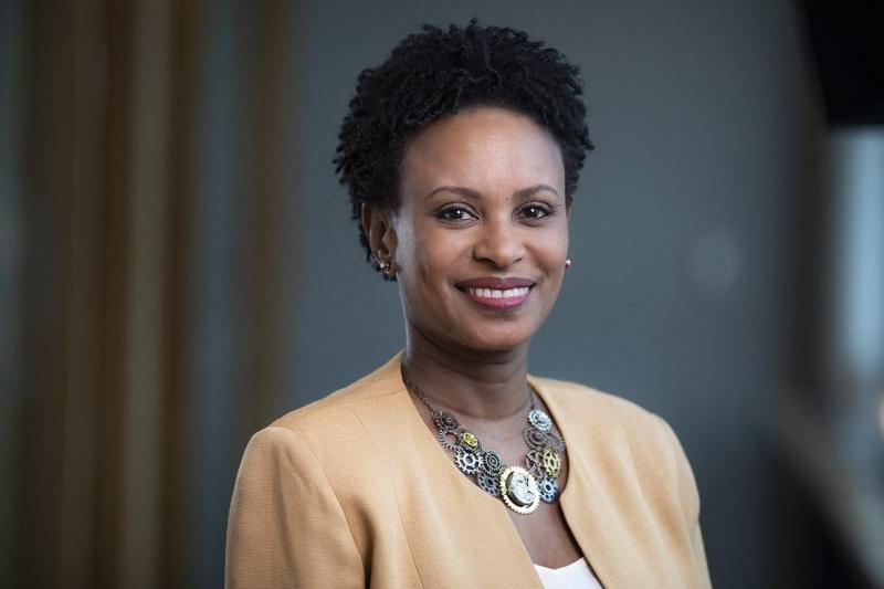 Portrait of Rhonda McEwen smiling.