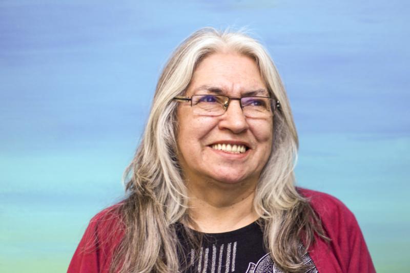 Portrait of Lee Maracle smiling.