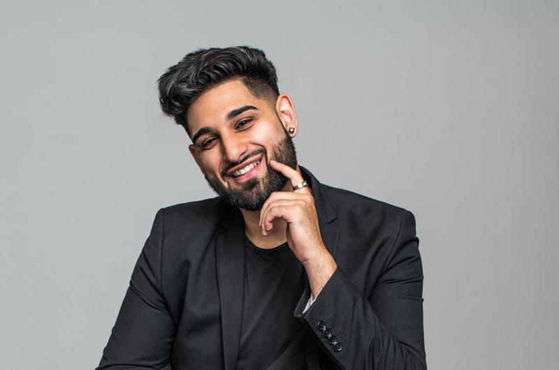 Portrait of Wali Shah laughing.