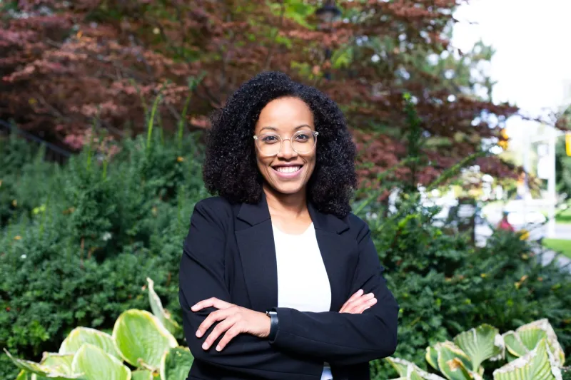 Portrait of Juliana Nunes da Silva standing outdoors