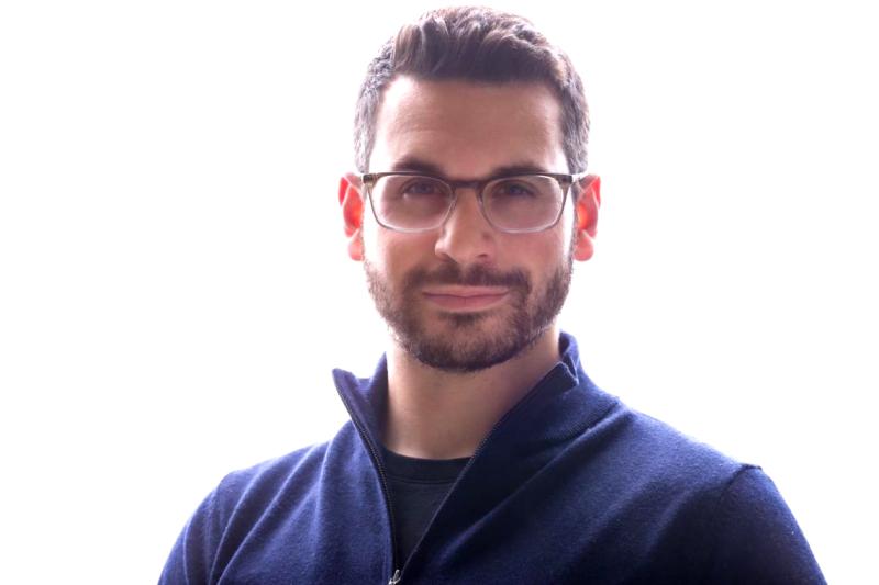 Portrait of David Harary smiling.