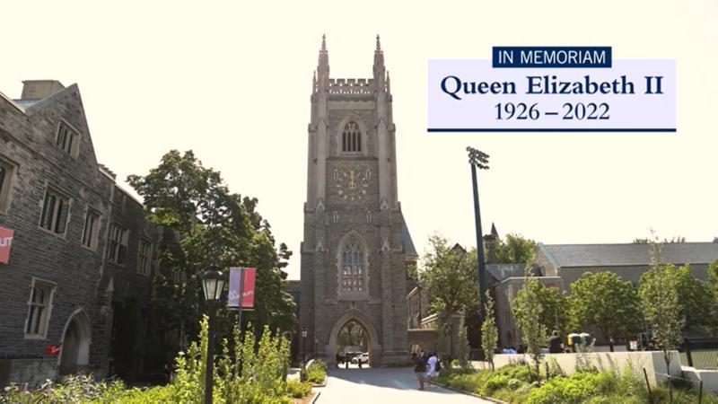 The Soldiers' Tower in sunlight, with text superimposed that says: In memoriam, Queen Elizabeth II.