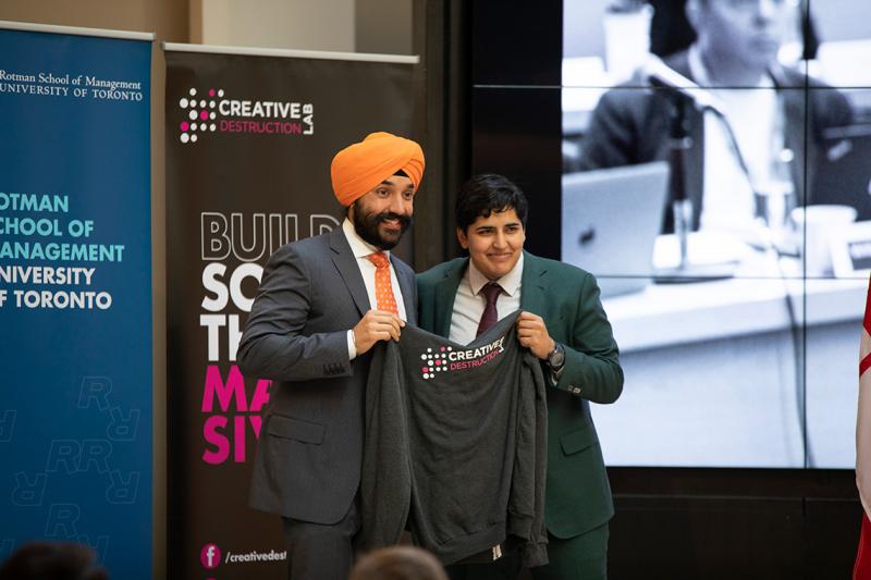 Navdeep Bains, Canada's minister of innovation, science and economic development poses for photographs with Sonia Sennik, the executive director of the Creative Destruction Lab (photo by Eugene Grichko)