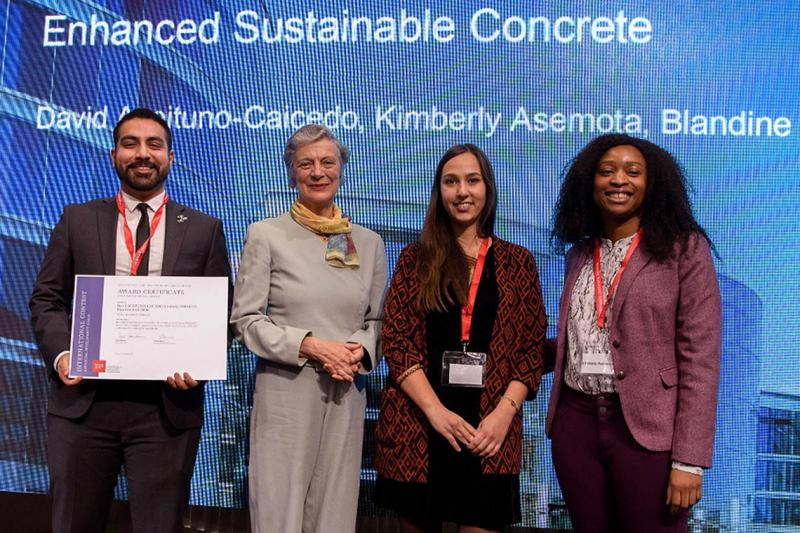 Kimberly Asemota (far right), Blandine Barthod (right) and David Aceituno-Caicedo (left) receive the SDSN Youth Special Prize in Geneva from Nane Annan, a lawyer and wife of former UN secretary general Kofi Annan (photo courtesy of Kimberly Asemota) 