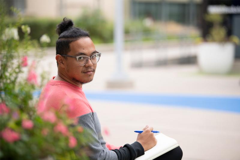 Poet and U of T Scarborough alumnus Adrian De Leon (BA 2014 UTSC, MTS 2017) released a book of poetry inspired by subway stops (photo by Alexa Battler) 