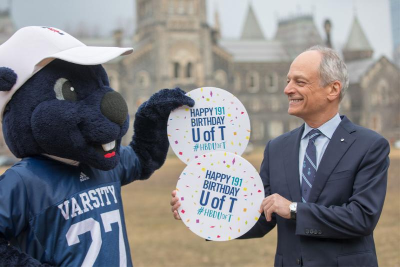 President Meric Gertler helps to celebrate the University of Toronto's birthday (photo by Lisa Lightbourn) 