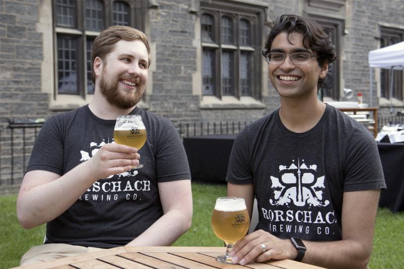 U of T alumni-turned-brewers Matthew Reiner and Mohan Pandit were thrilled to share their beer with patrons at Hart House's beer festival (Photo by Romi Levine) 