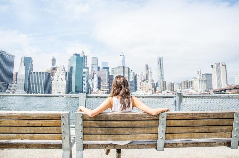 Woman looking at a city skyline