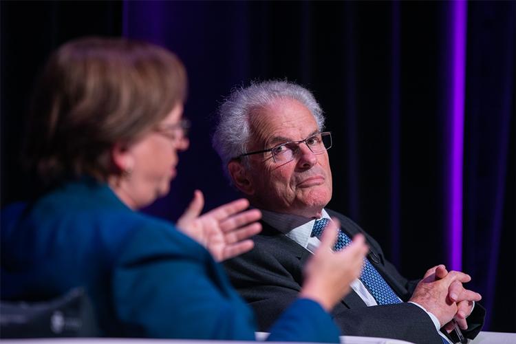 Lord John Anthony Dyson listens to Elena Kagan speaking.