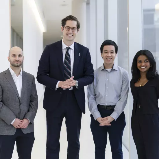 Dr. Nowak posing for a photo with three other people