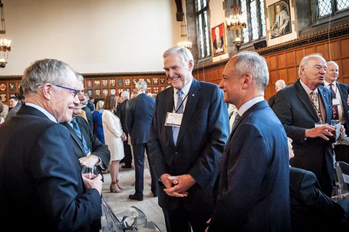 Wilson greeted guests at the May tribute, including leaders from U of T such as Bruce Kidd (left), vice-president of U of T and principal of U of T Scarborough (photo by Lisa Sakulensky)