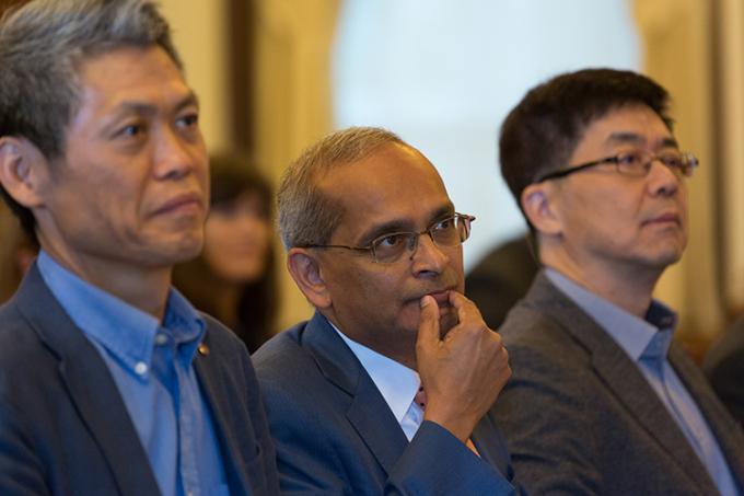 Vivek Goel, U of T's vice-president of research and innovation, is flanked by I.P. Park, the president and CTO of LG Electronics (right), and Peter Kim (left), senior vice-president, artificial intelligence (photo by Geoffrey Vendeville)