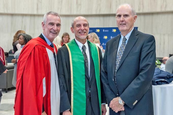 Robert McNutt (right) with Ulrich Krull (centre), vice-president and principal of U of T Mississauga, at Krull's installation. Ian Orchard, the former principal, is at left.