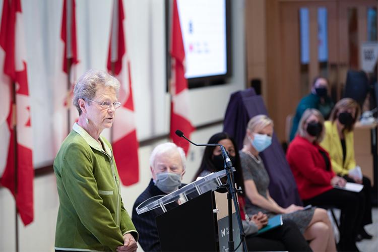 Patricia Brubaker speaks, and Richard Alway, Sonia Sidhu, Christine Allen, Christine Loth-Brown and Lynn Wilson listen.