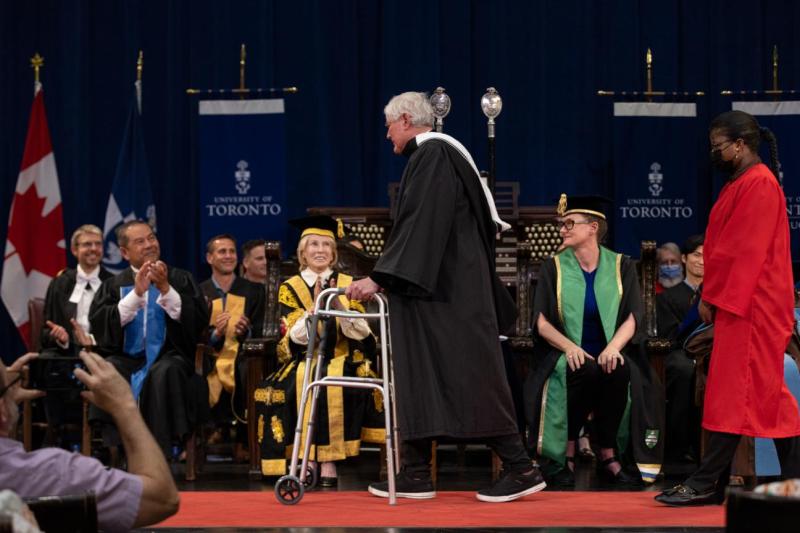 John Bond crossing the stage at graduation