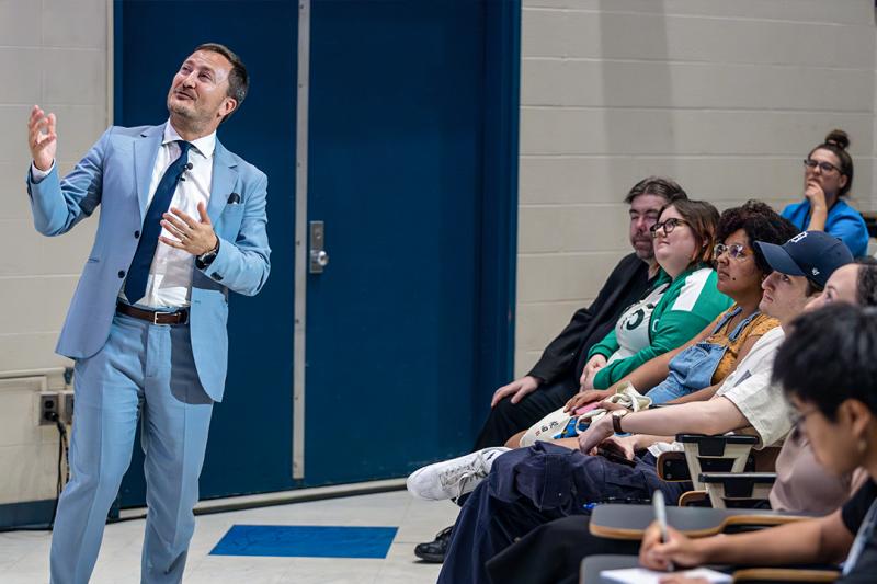 Professor Paolo Granata in lecture hall with audience members.