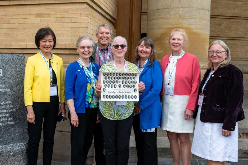 Photo of alumni together reunited at their 50th anniversary.