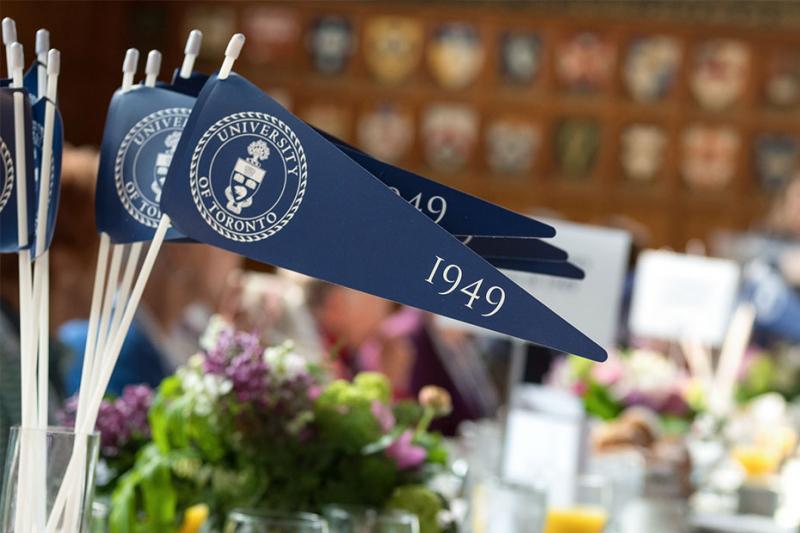 Table flags showing the 1949 graduation class
