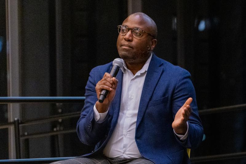 A man speaking on stage