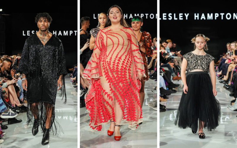 Lesley Hampton on the runway at one of her shows, flanked by a model on each side