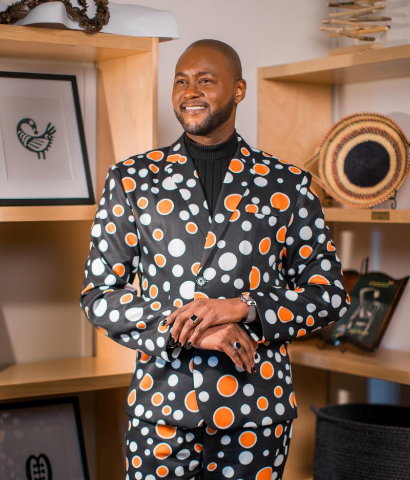 A portrait of Dr. ABC standing