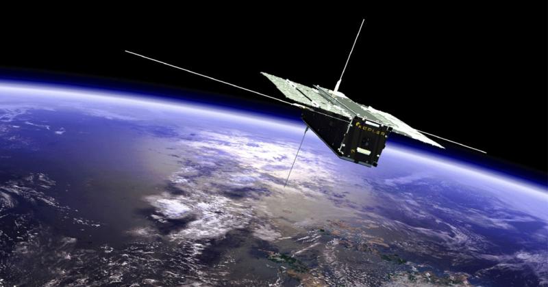 A box-shaped satellite with solar panels spread out like wings floats high above the Earth. A logo on its side says Kepler.