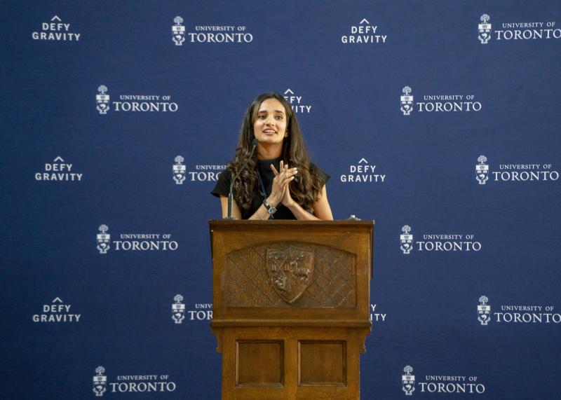 Rahimi Kamal at a podium