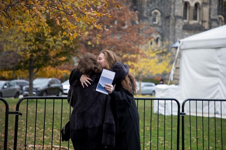 A well-deserved big hug outside Convocation Hall (photo by Lisa Lightbourn)