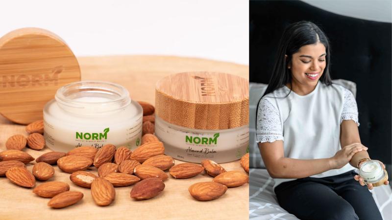 Body cream with almonds and a woman using it