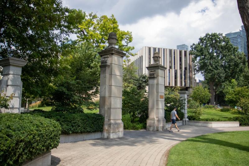 Stone pillars and bushes mark the south entrance to Philosopher’s Walk.