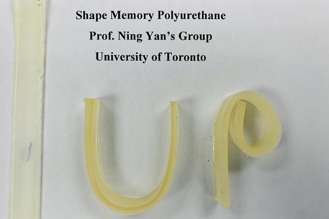 A sample labelled Shape-Memory Polyurethane shows thin rubbery strips curled into the letters U and P.