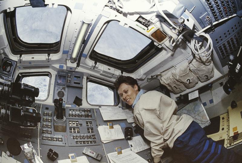 A photo of U of T alum Dr. Roberta Bonda in space looking at earth.
