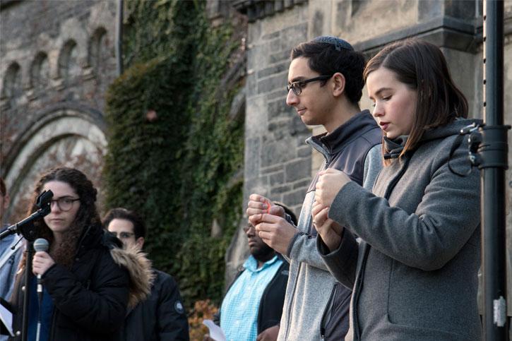 A candle was lit for each person killed in the synagogue shooting. (photo by Romi Levine)