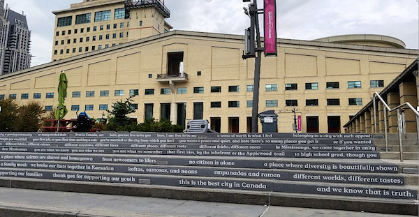 The wide steps before Mississauga City Hall have phrases of poetry written on the risers. For example: no citizen is alone.