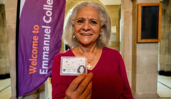Esther holding up her Vic student card