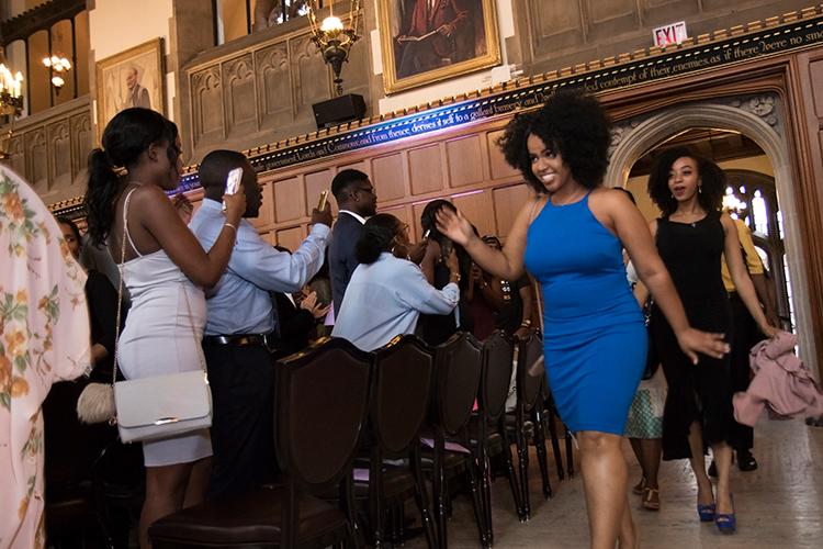 The class of graduating Black students makes an entrance at Hart House at the first-ever Black graduation at U of T (photo by Geoffrey Vendeville)