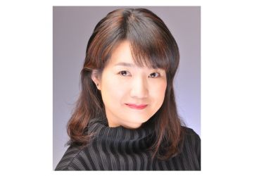 A portrait of Minako Uchino smiling.