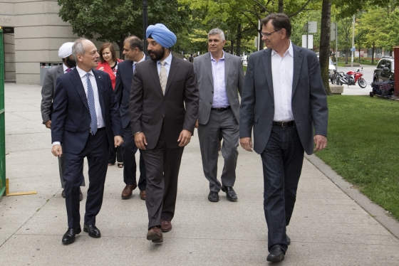 U of T President Meric Gertler, Navdeep Bains, the federal minister of innovation with roundtable group
