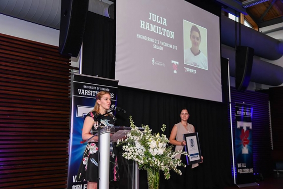 Julia Hamilton, who led the Varsity Blues women’s squash team to three consecutive OUA titles from 2002 to 2005, while pursuing a medical degree, spoke at the induction ceremony (photo by Martin Bazyl) 