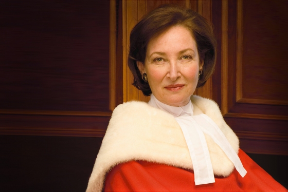 Rosalie Abella smiles while wearing her Supreme Court of Canada robes.