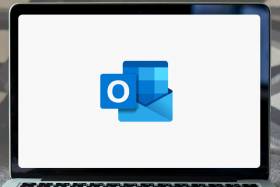 A laptop with the Microsoft 365 logo