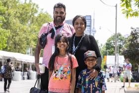 Photo of family together in Alumni Fest.