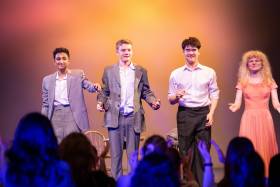 Four students prepare to take a bow on stage at Hart House Theatre drama festival
