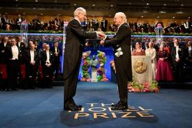 Geoffrey Hinton on stage receiving the Nobel Prize