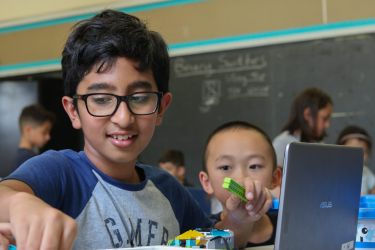 Child creating digital pet