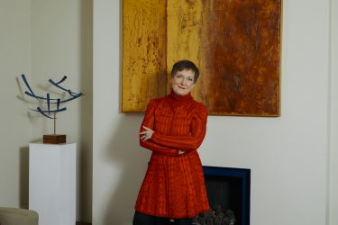 Photo of Avivah Wittenberg-Cox standing in a room looking at the camera