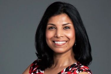 Portrait of Dr. Lipi Roy, smiling at the camera