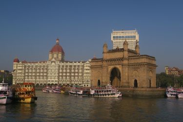 landscape image of building in Mumbai overlooking a body of water