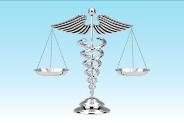 Medical symbol with balanced scales